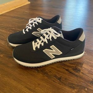 Men’s black and white New Balance 501 sneaker